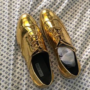 Gold patent leather loafers size 8.5